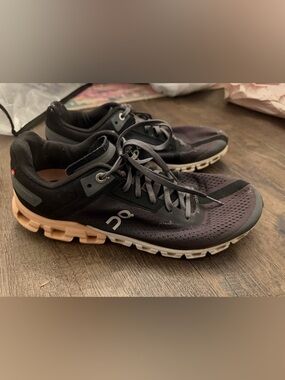 On Cloud Women’s Black and Tan Cloudtec Athletic Shoes